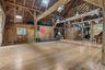 A flexible open layout with catering kitchen, spacious flex room and upper gallery creates an exceptional setting for gatherings, celebrations, or cre