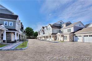 2016 built 3 story Townhome complete with 9 foot ceilings, hardwood flooring, open floor plan with sliders to deck and gas fireplace.