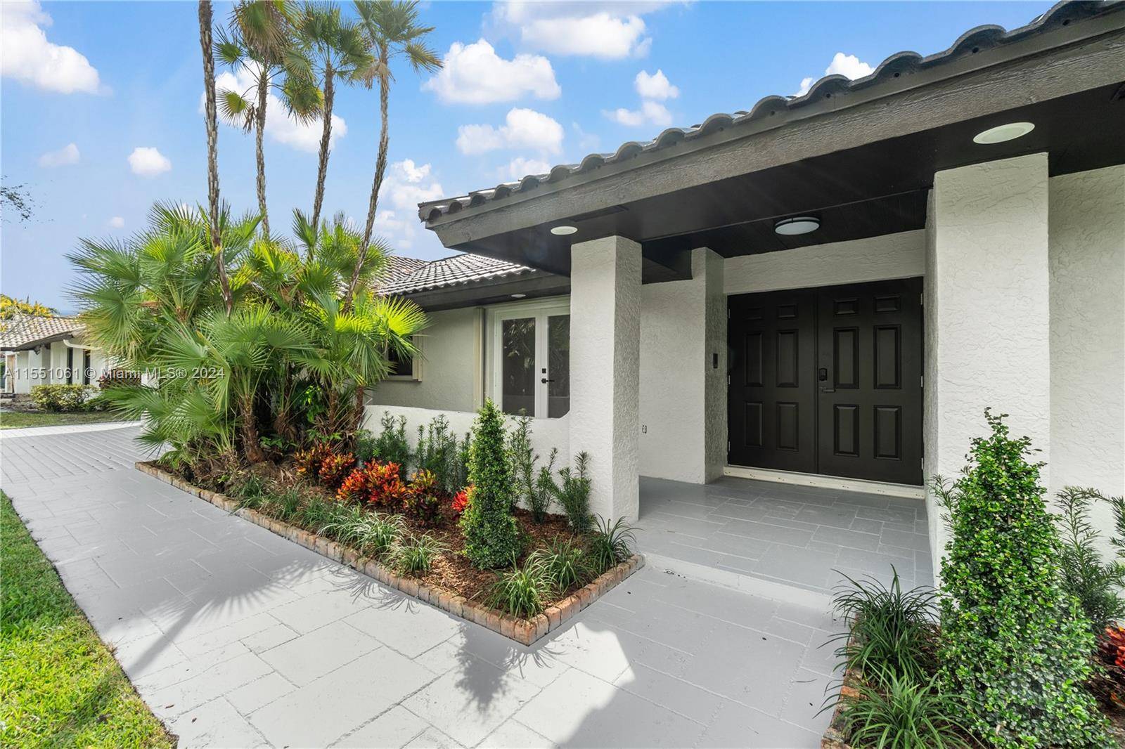 Fully upgraded Mediterranean house located in prestigious Doral Estates a very safe low density gated community, part of Doral Trump Golf Course.