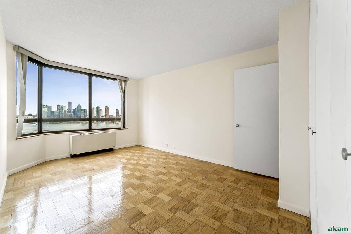 Freshly painted spacious high floor 1 bedroom with amazing East river views from each room.