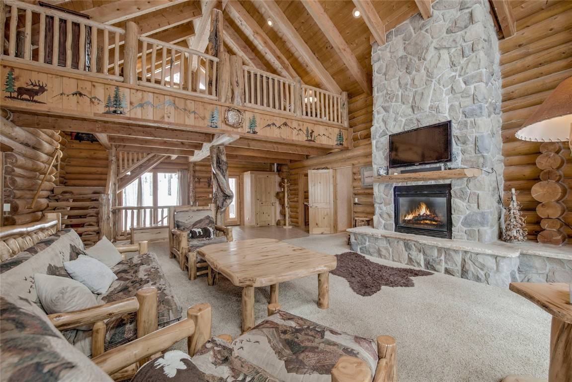 Step into this well maintained and cared for log home in the coveted upscale neighborhood of Timber Creek Estates.