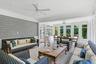 Sunroom featuring recessed lighting, carpet, and crown molding