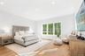 Bedroom with light wood-type flooring and recessed lighting