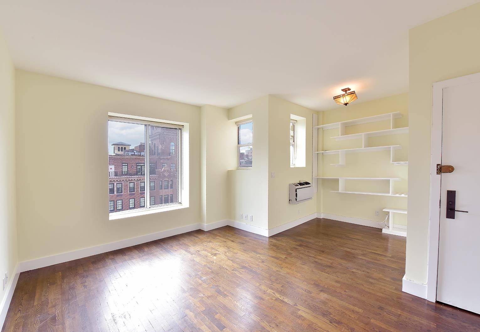 This renovated, pre war Greenwich Village 1 Bedroom apartment features open south, east and west exposures with amazing natural light and views of the Freedom Tower and Grace Church.