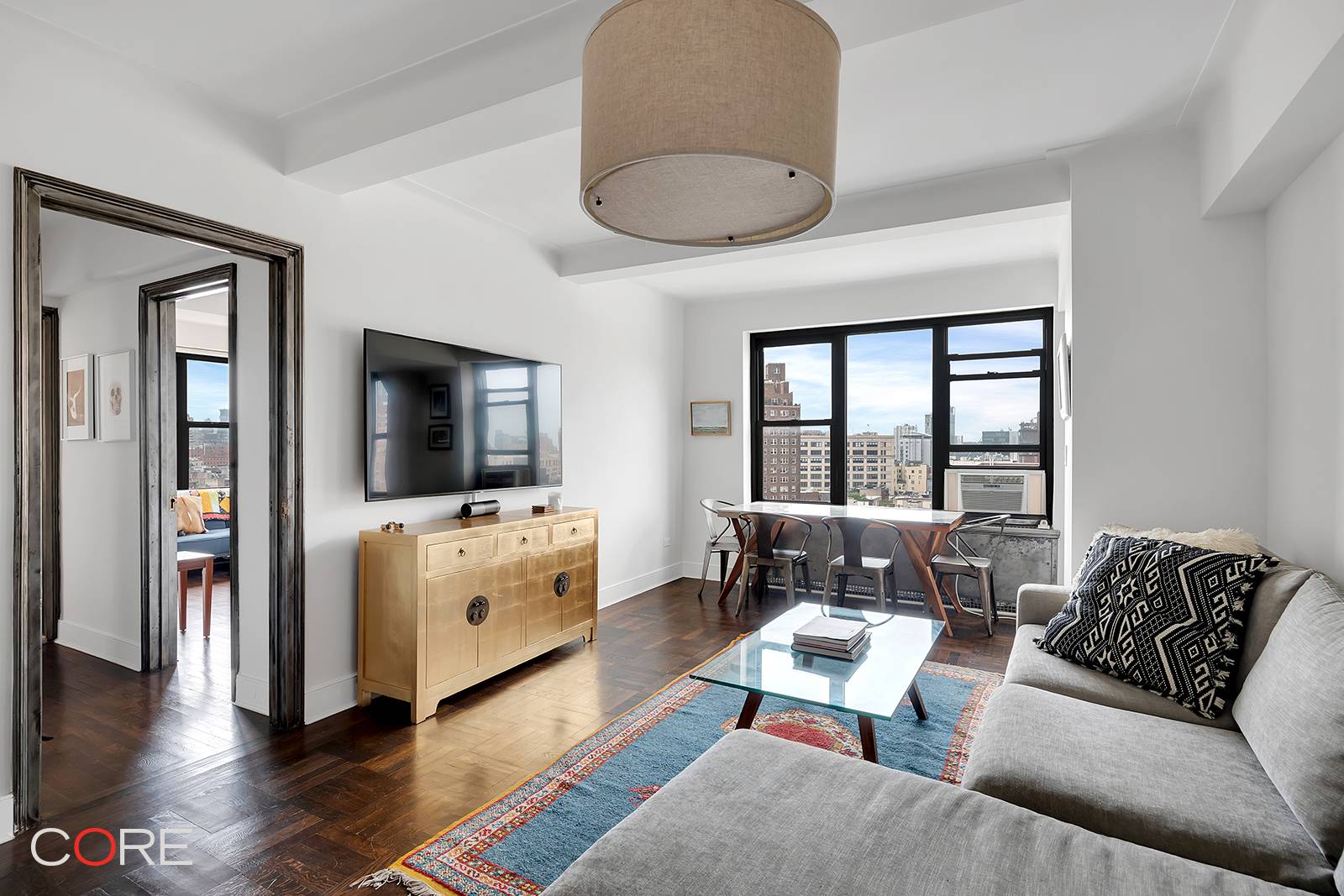 Available furnished for a short term lease through March 2021, this spacious and bright one bedroom, one bathroom home is perched on the 12th floor of 56 7th Avenue.