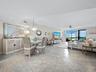This meticulously kept home is open and beautifully turn-key furnished with a gorgeous view to the Gulf of Mexico