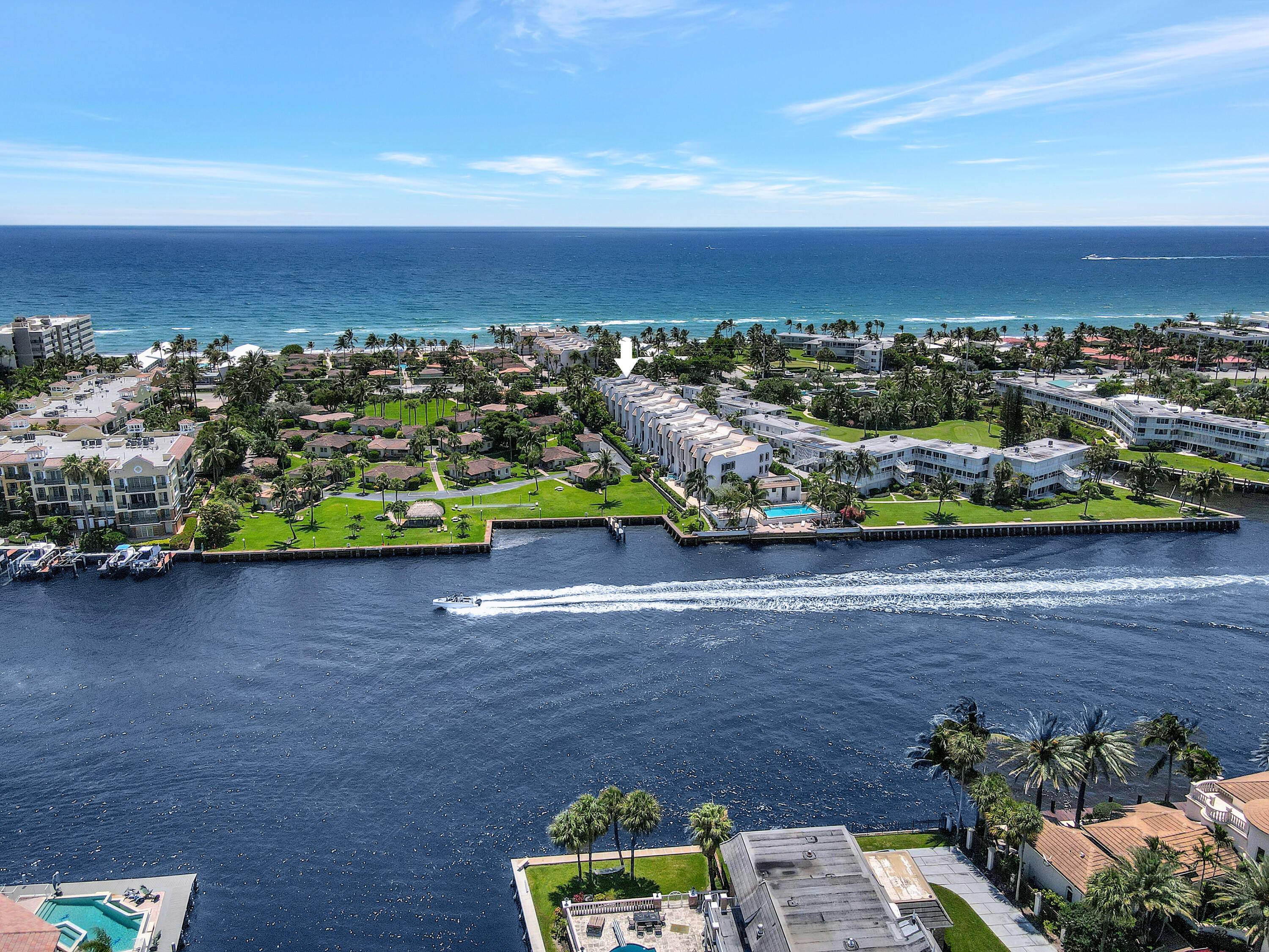 Enjoy the best of both the Intracoastal and Beach access in this tri level Hillsboro Mile Townhouse.