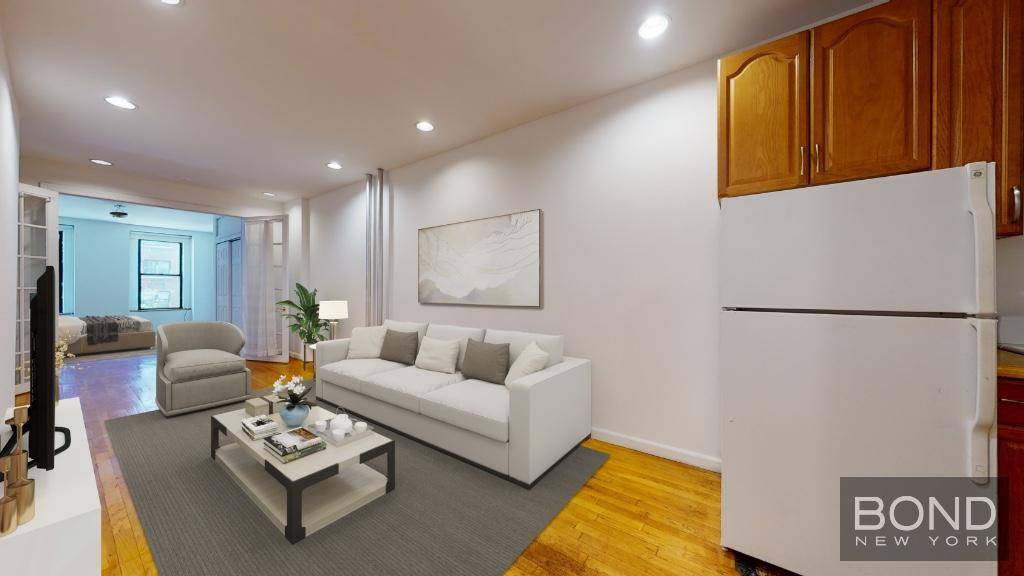 Space lovers dream in this unique 800 SF 2 bedroom floor through with front and back exposure in prime Upper East Side.