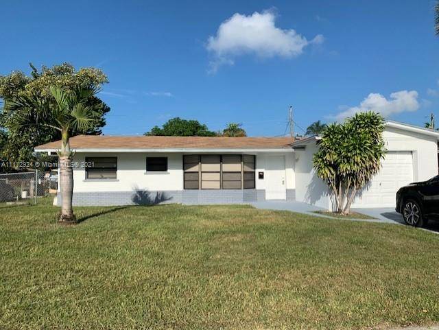 SPACIOUS 4 BEDROOM 2 BATH HOME WITH A GREAT FAMILY ROOM LOCATED AT THE DESIRABLE AREA OF LAUDERHILL, FL READY TO MOVE IN.