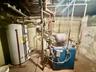Utility room with gas water heater
