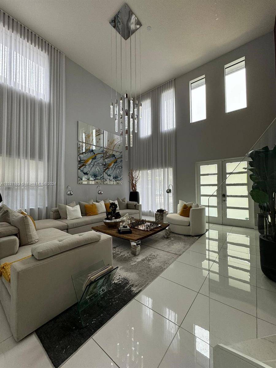 Modern and Elegant and Smart Home 4H 3B single family home in the prestigious community of Satori, Miami Lakes.