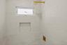 Bathroom view of tiled shower