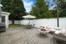 Rear patio with pavers. Fully fenced in property