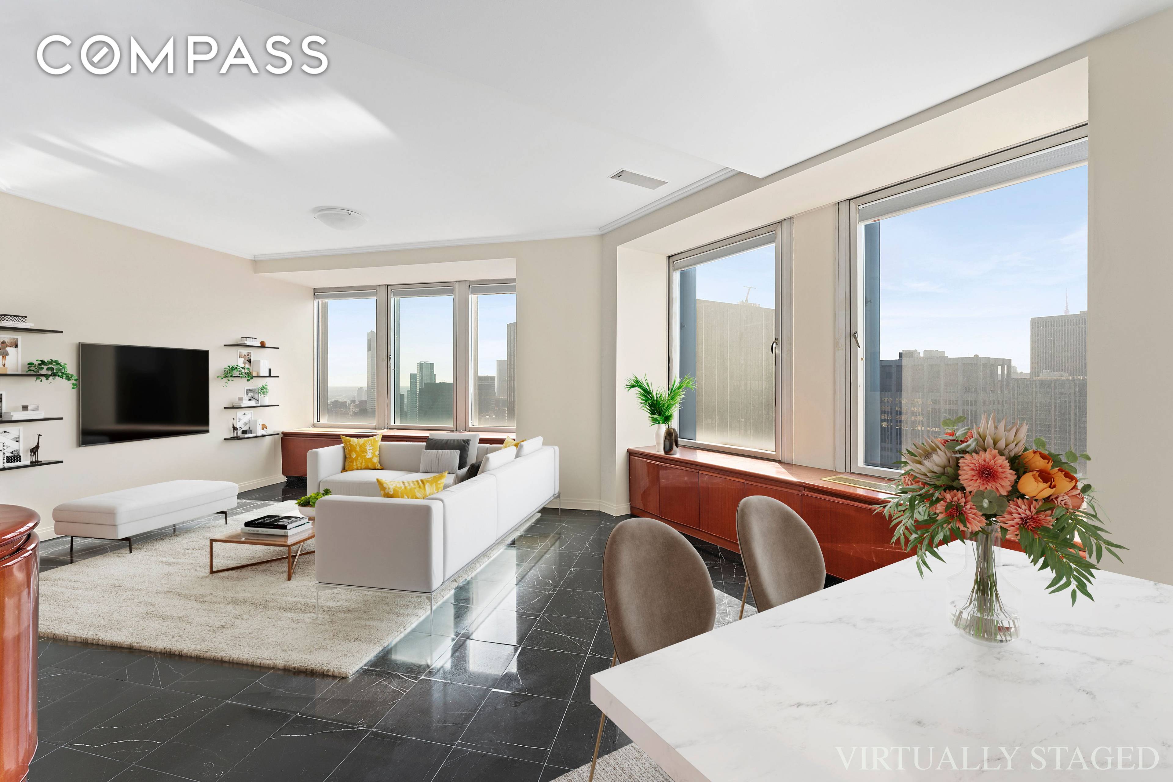 Midtown Skyline and Hudson River views await from this sprawling home on the 55th floor of City Spire !