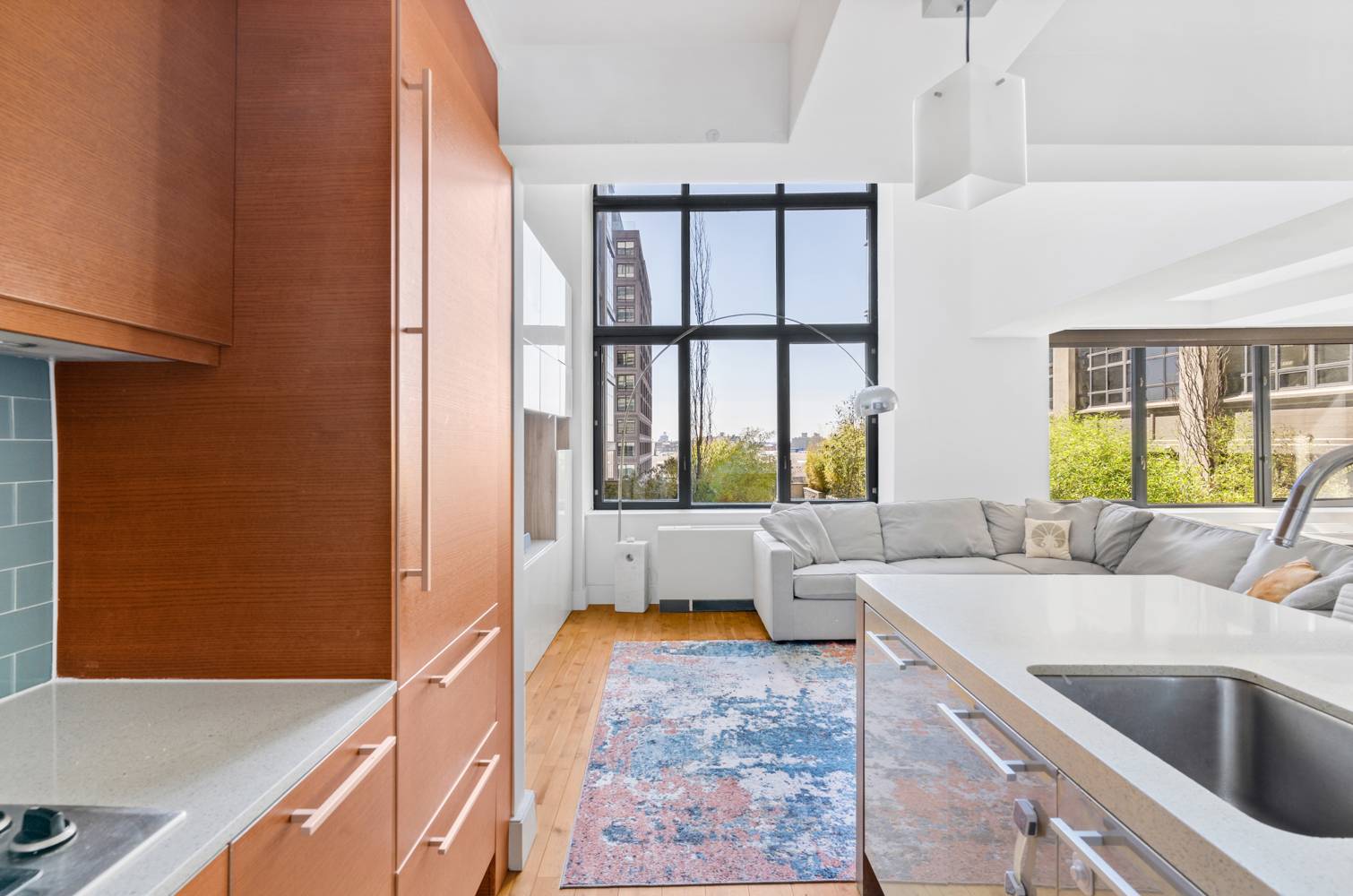 Spacious One Bedroom Duplex in FULL SERVICE LUXURY Brooklyn Heights Condo This full service converted warehouse loft with high end finishes is an airy getaway in historic Brooklyn Heights.