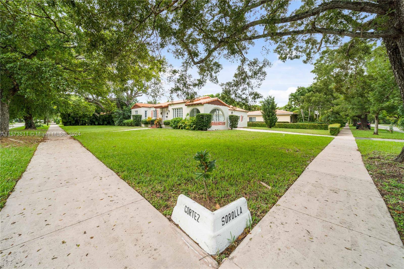 Beautiful Home in the heart of Coral Gables in a huge doble lot surrounded by mature trees, recently painted.