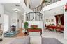 Winding staircase with wrought iron railing