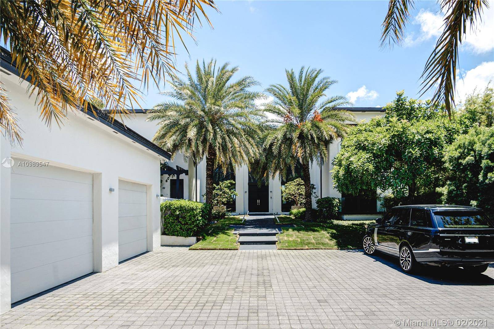 Stunning Modern Home located on the prestigious Hibiscus Island with a 24 7 guard gate and patrol.