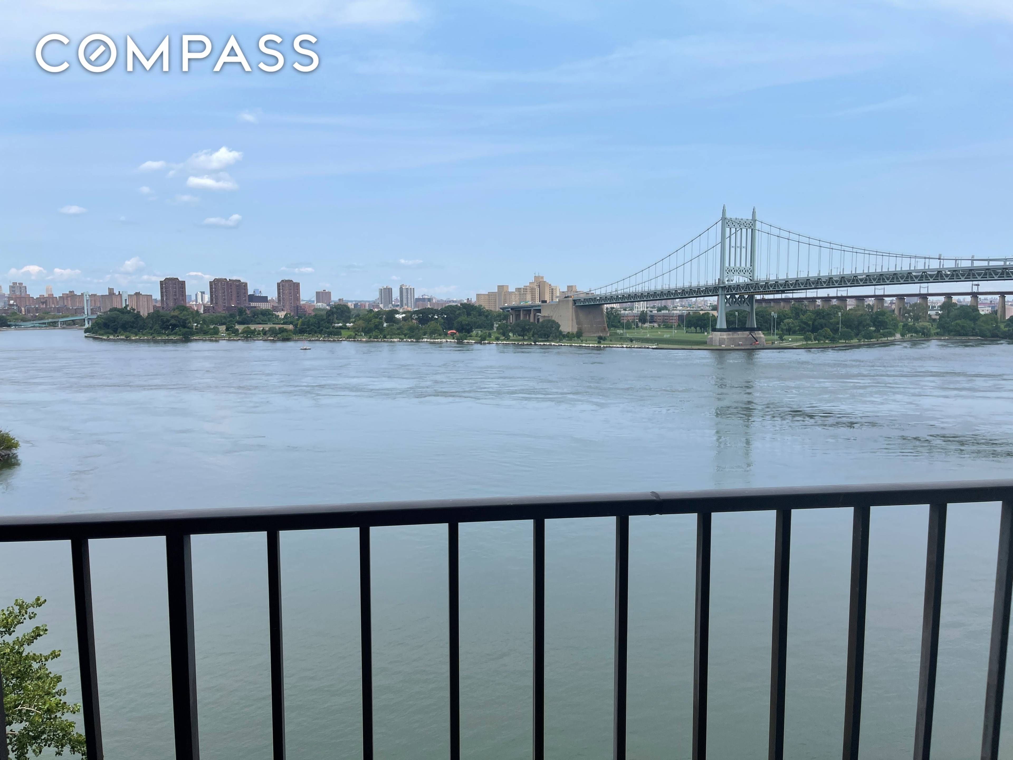 Panoramic view of East River, RFK Bridge and lower Manhattan.