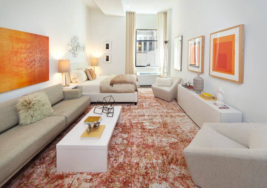 Great studio apartment with gourmet kitchen featuring stone countertops and stainless steel appliances, in unit washer dryer, and wood floors throughout.