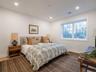 Bedroom featuring baseboards and recessed lighting