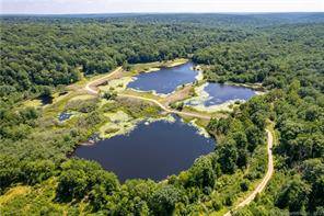 Newly adjusted price ! OVER 330 ACRES OF NATURAL BEAUTY IN CENTRAL CT Entering through the private gates off Saner Road, you immediately feel as if you have left the ...