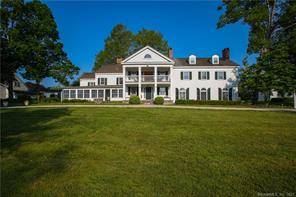 The Ultimate Country Compound sited on 23 park like acres with stunning western views.