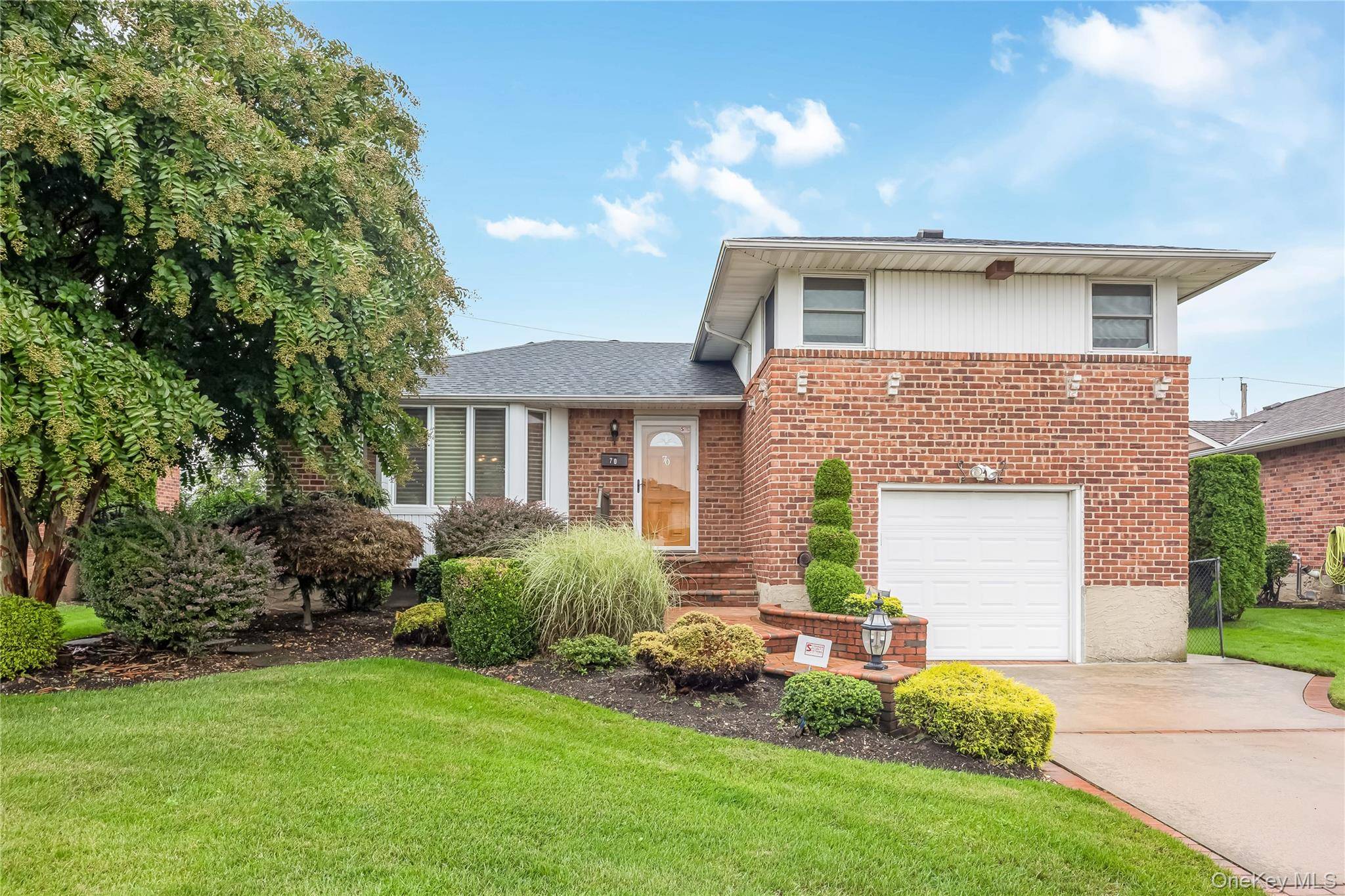 Welcome to 70 Norman Lane, located on the border of Levittown and East Meadow and within the sought after and very desirable East Meadow School District.