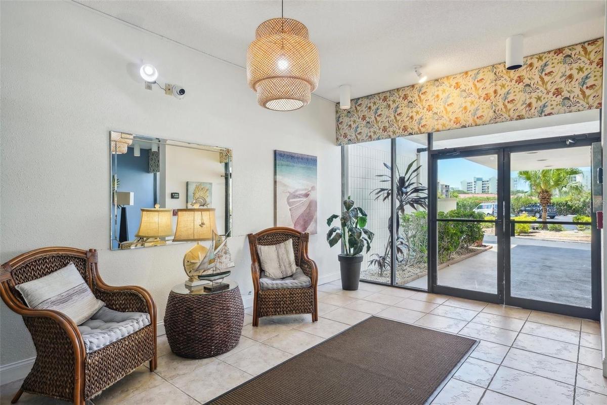 BUILDING LOBBY, ENTRY BY THE POOL!