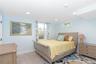 Bedroom featuring baseboards and recessed lighting