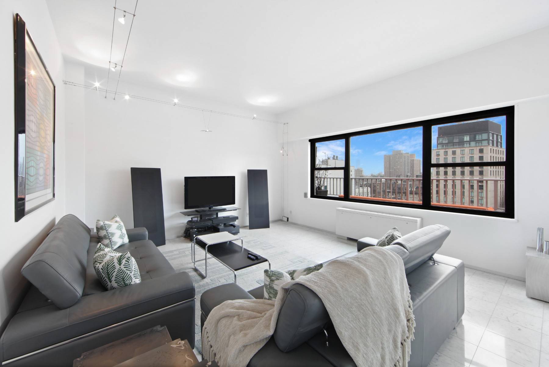 Experience unit PHO, an exceptional penthouse with breathtaking views of downtown Manhattan and the World Trade Center.