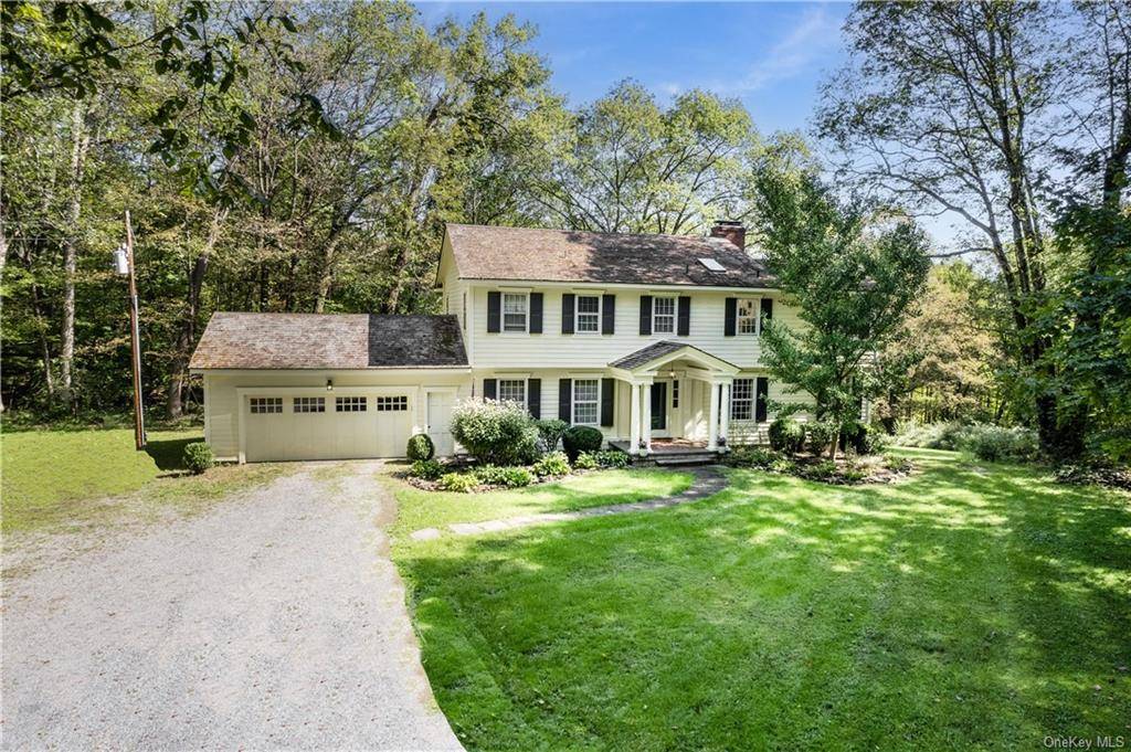 This stunning Georgian style Colonial situated in a quiet cul de sac, on 4.