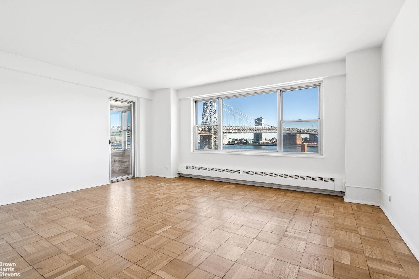 Light filled and airy two bedroom balcony home with panoramic East River views to Brooklyn and beyond !
