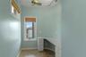 Laundry Room and intimate Office Space w/ View of River. Could also be a great walk-in closet for Ground Floor Primary Suite