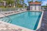 Relax at your quaint communities private pool oasis.