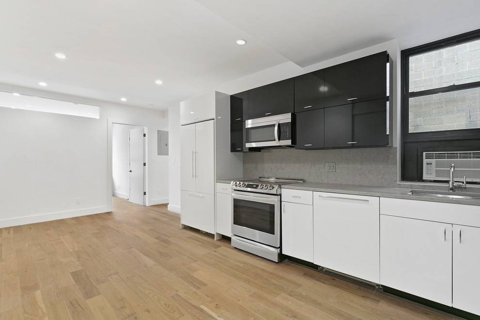 Beautiful, spacious renovated three bedroom apartment has equal sized large bedrooms, full sized appliances, W D in unit and custom built closets.