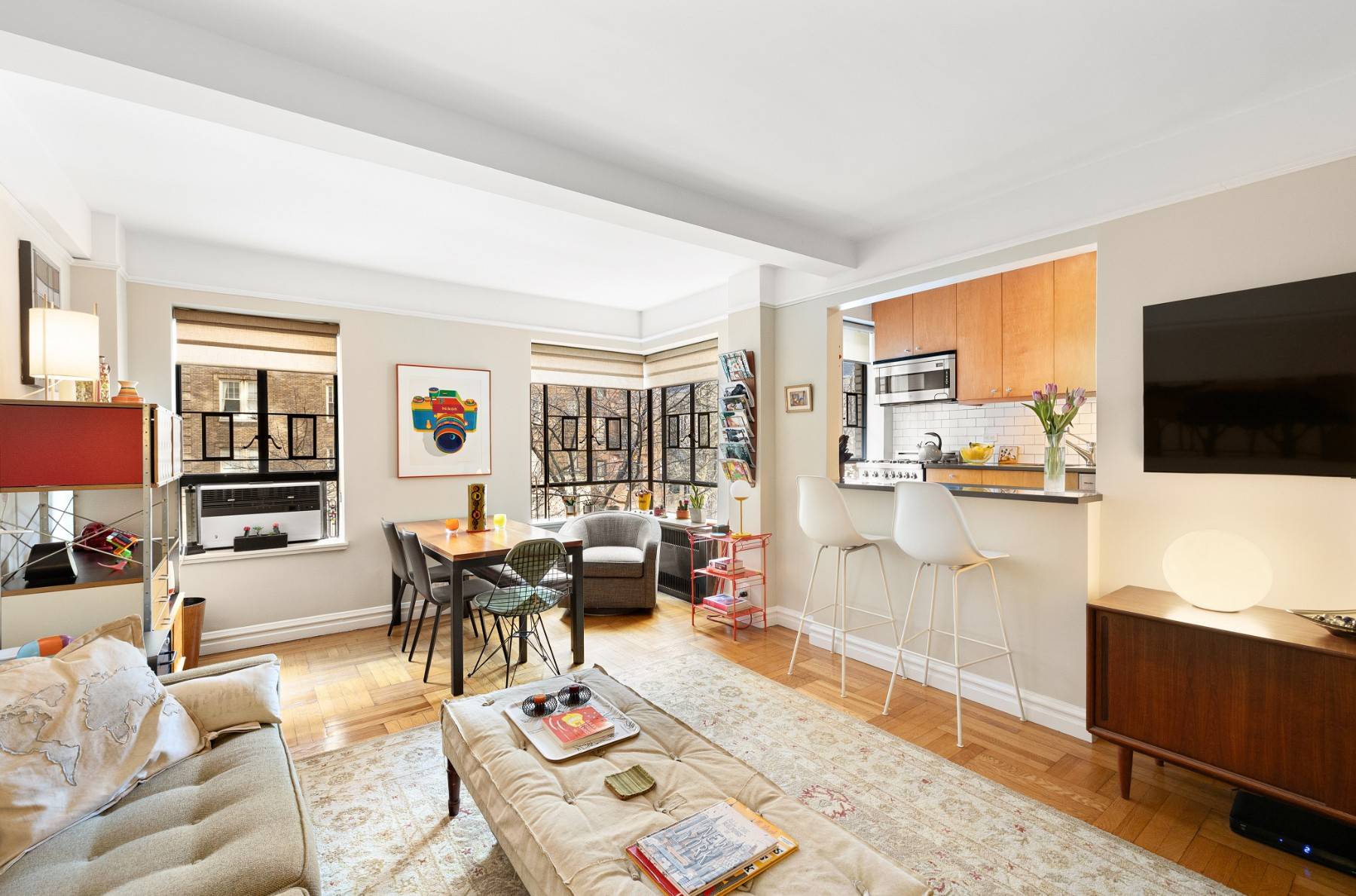 Welcome to Apartment 4F, a spacious studio measuring roughly 700 square fee to which the current owners brought a ton of creativity and designed a beautiful home that is move ...