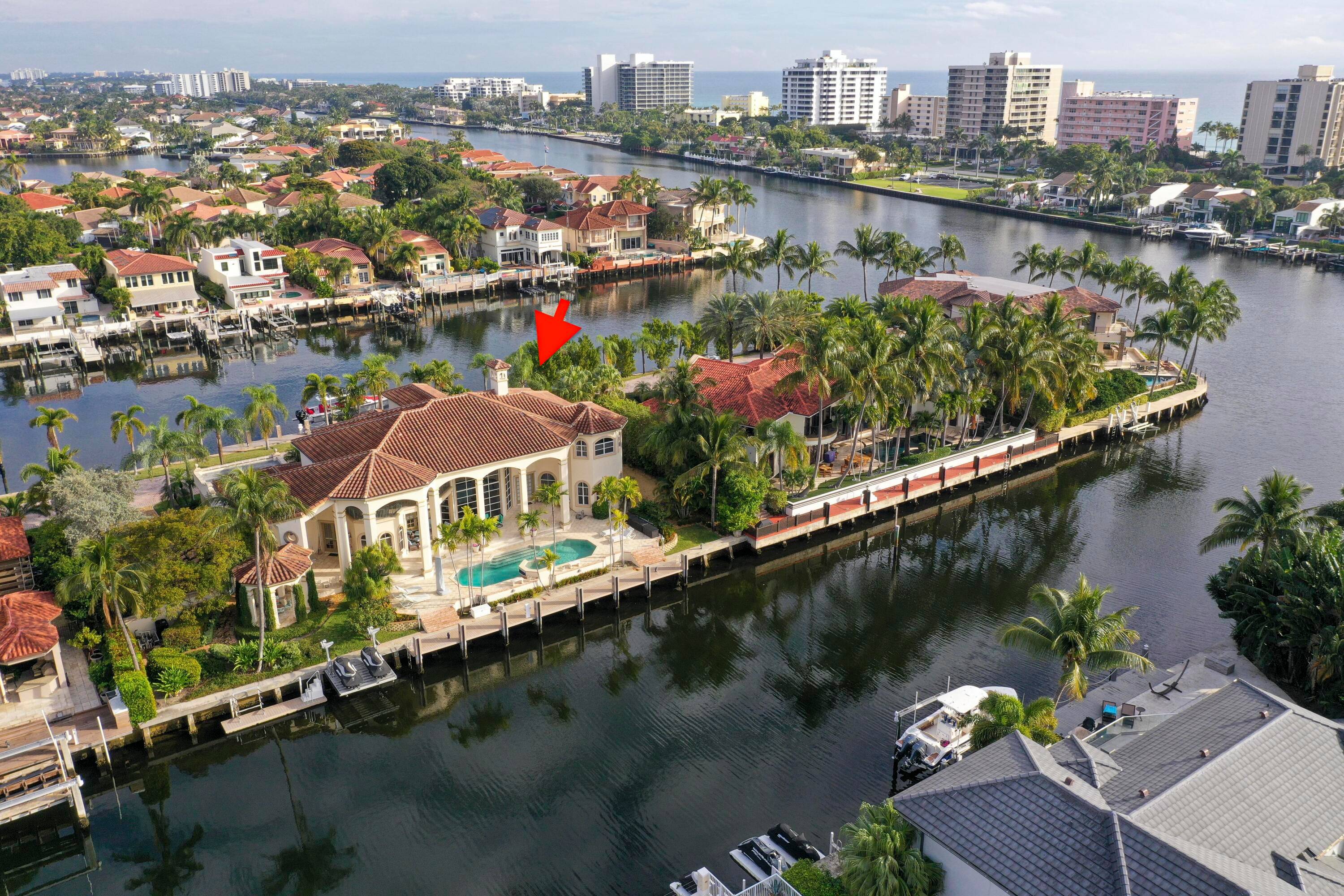 Beautiful Custom Built home located on a rare ''Double Waterfront'' gated street with a total of 300ft of deepwater.