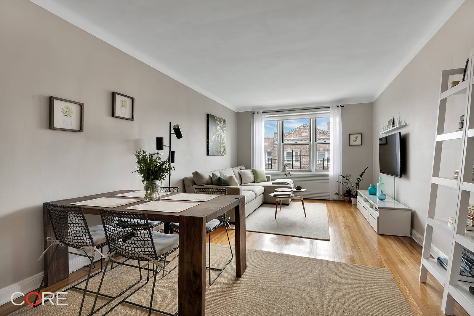 This massive and bright corner one bedroom home is perched on the top floor of a superbly located pre war co op in the heart of the Jackson Heights Historic ...