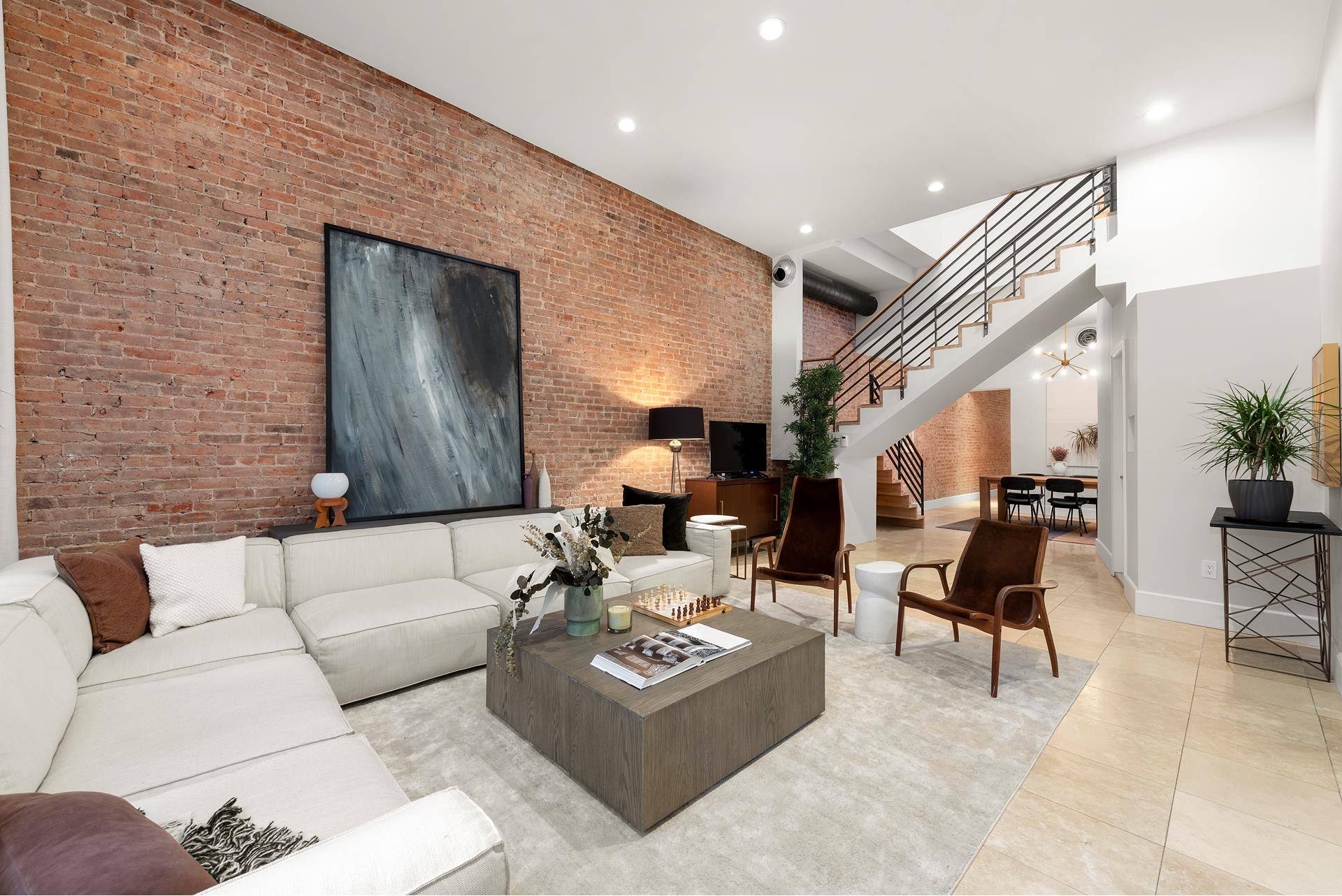 Tribeca penthouse condominium in mint condition has three bedrooms, three full baths, powder room, private laundry, central air and two fabulous private terraces.