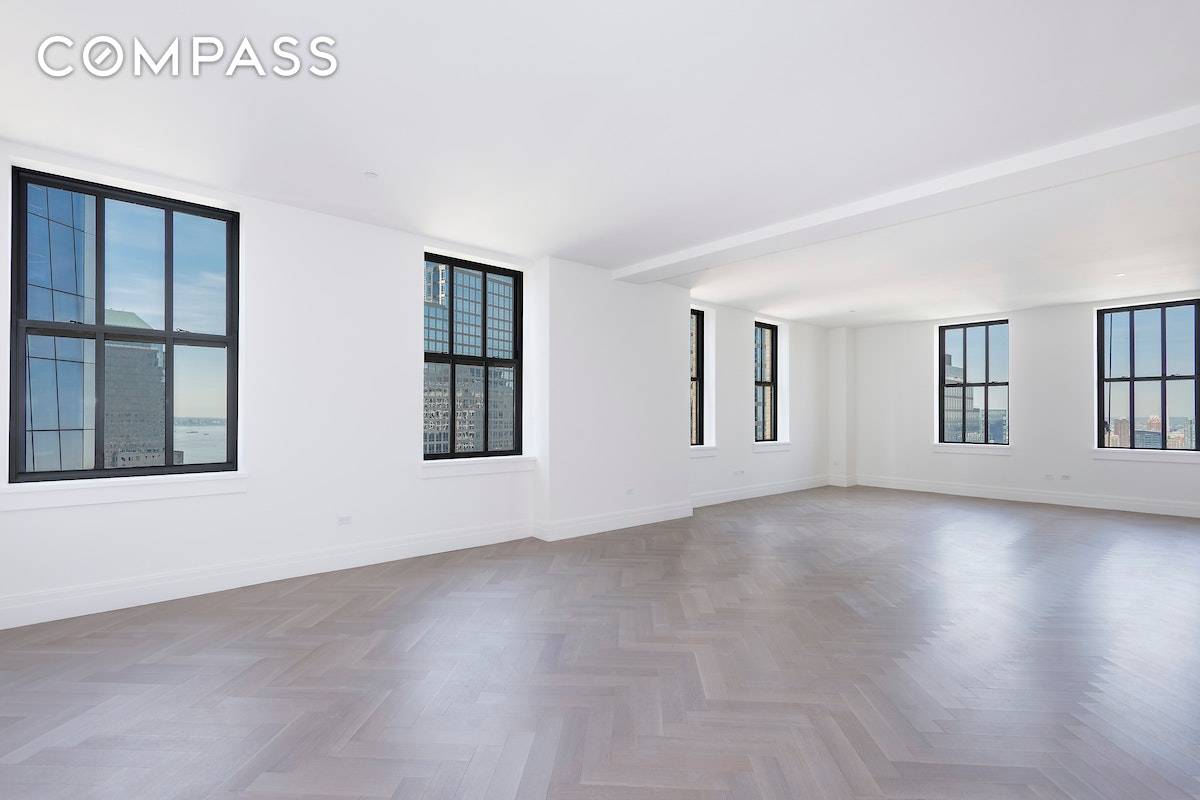 Stunning views of New York Harbor and the Statue of Liberty from this high floor, corner three bedroom, four bathroom apartment plus home office.