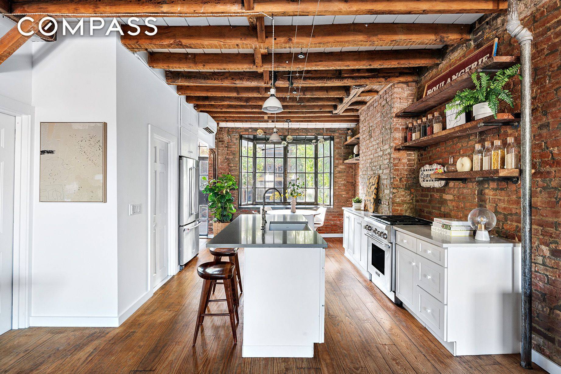 Welcome to 256 Van Brunt Street, a spacious and unique 3 story townhouse in the heart of desirable Red Hook.