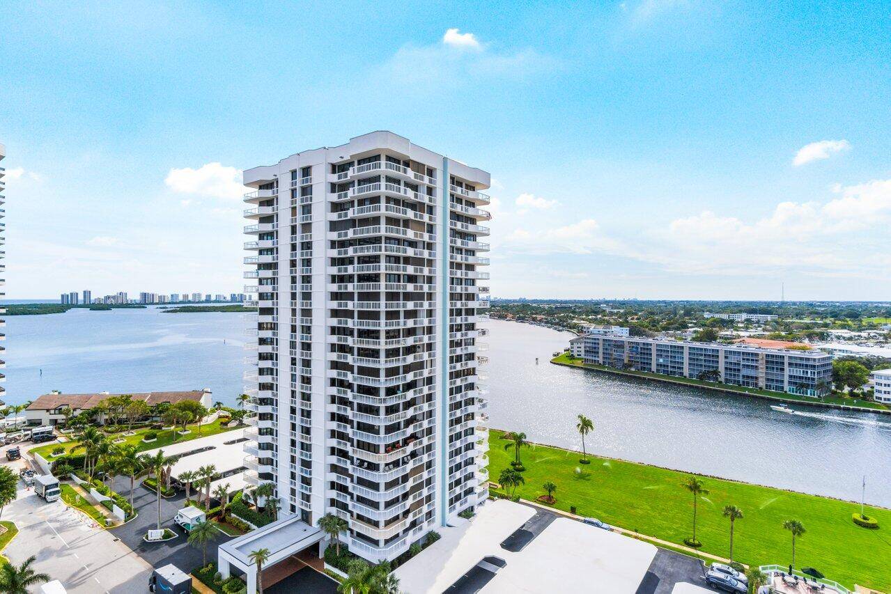 Welcome to the pinnacle of waterfront living at 108 Lakeshore Drive, a luxurious condominium in the highly sought after Old Port Cove community.