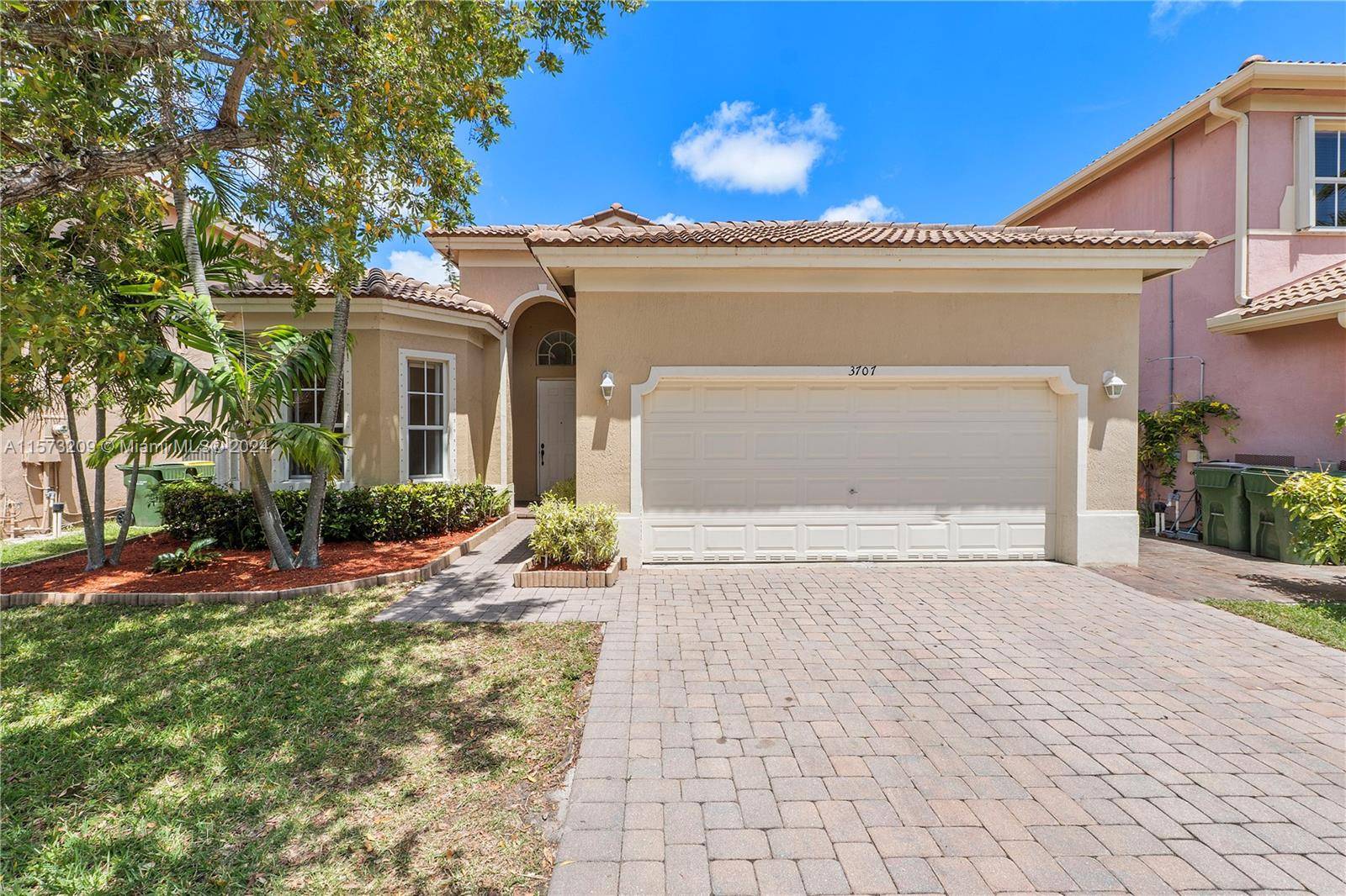 Nestled within the Waterstone Gated community, this spacious 5 bedroom, 3 bathroom home invites you with soaring high ceilings to unwind with tranquil water views of the lake from your ...