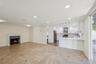 Open-concept living space featuring a dining area, kitchen, and living room