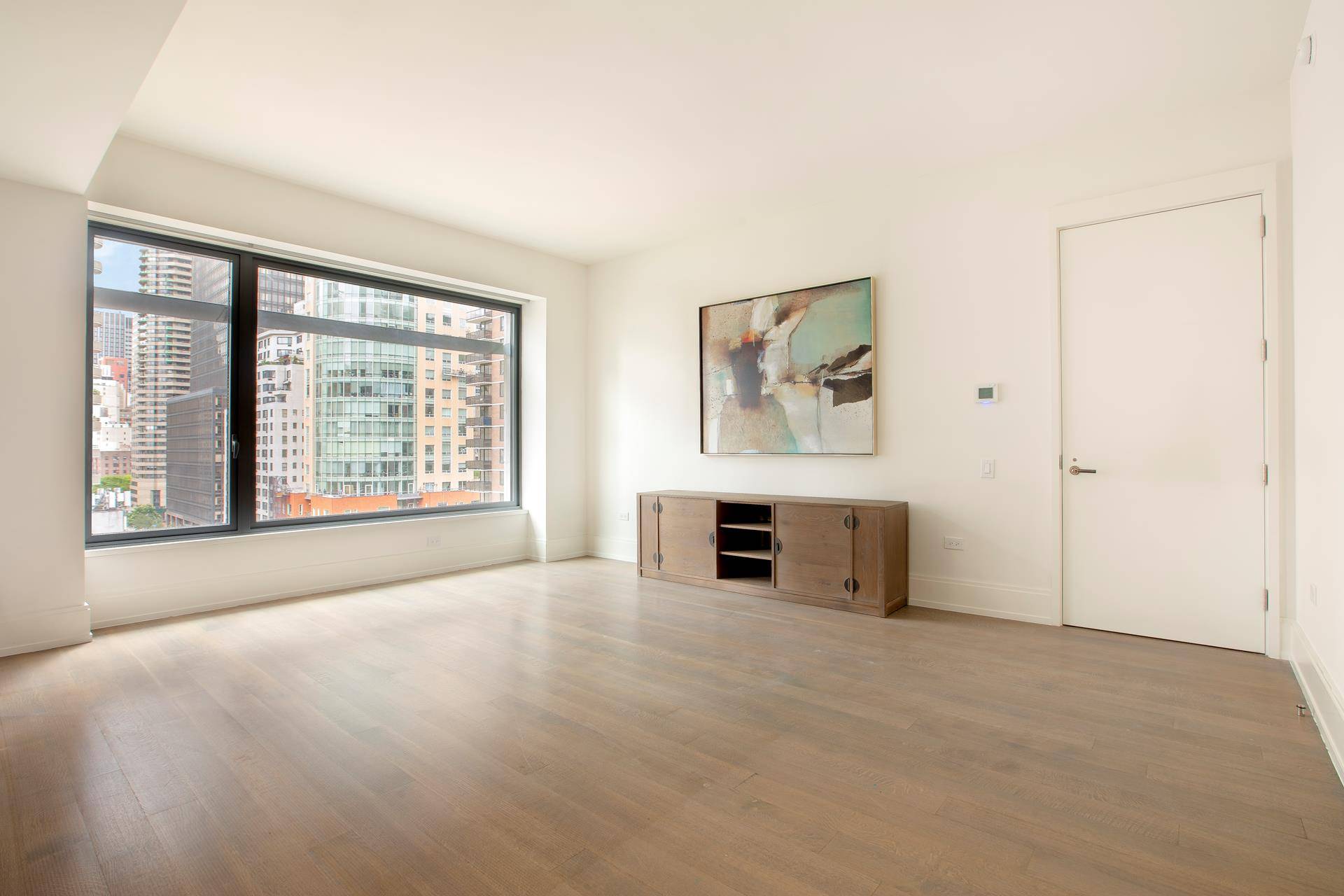 Residence 8A at 301 East 50th Street is a double corner, 1, 447 SF two bedroom, two and a half bath condominium located in Manhattan's Turtle Bay neighborhood.