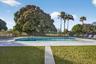 Oversized Pool with view of Ballenisles Golf Course