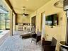Pool Area w/ Furniture and Outdoor Kitchen