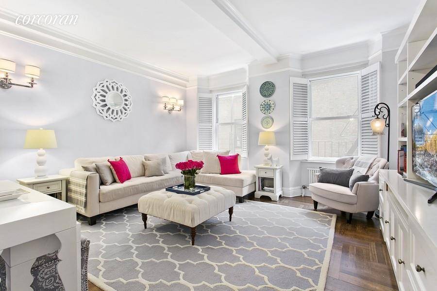 Elegant pre war two bedroom apartment with chef's kitchen and laundry room located on East 86th Street at Madison Avenue one block away from Central Park and the Museum Mile.