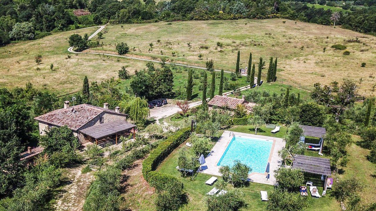 Agriturismo for sale in Tuscany near Chianciano e Montepulciano near thermal baths. Two buildings, swimming pool, olive grove